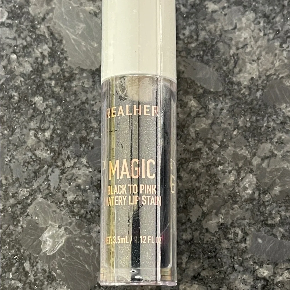 Real Her Magic Black to Pink Lip Stain your own perfect shade in a glossy stain